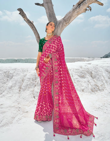 Elegant Pink Pure Georgette Bandani Patola Saree with Zari Weaving & Luxurious Heavy Work