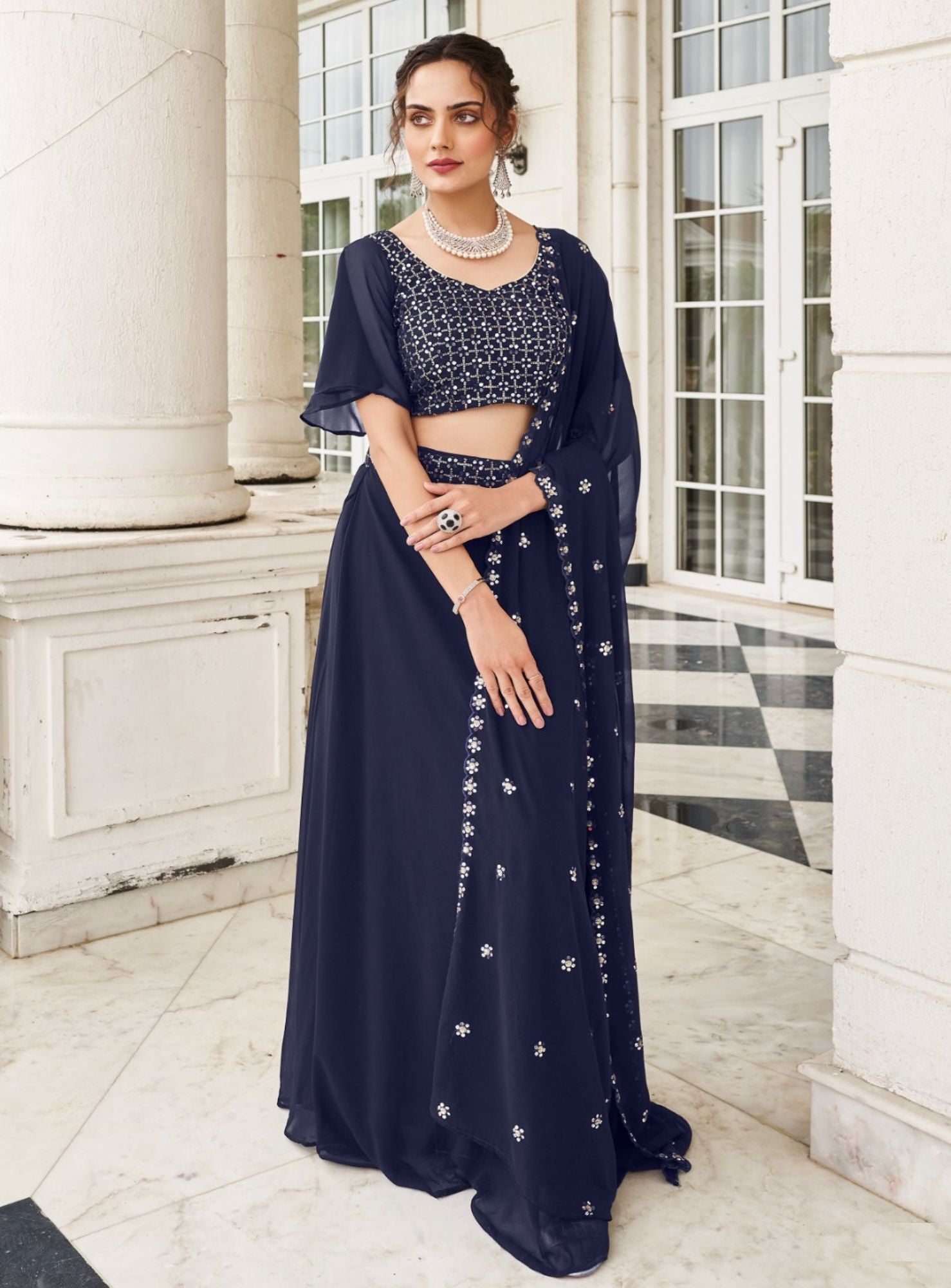 Trendy And Elegant Blue Georgette Lehenga Set - Rent