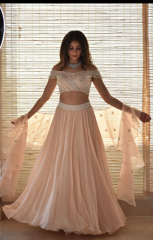 Designer Kanika Kapoor's Beautiful Baby Pink Color Georgette Lehenga - Rent